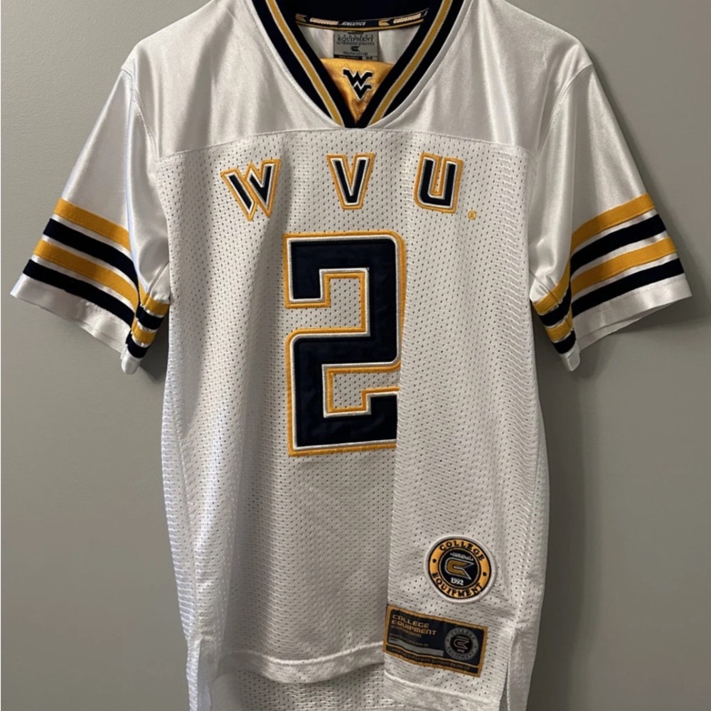 WVU Officially licensed, College Equipment Colosseum Athletics football jersey.